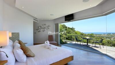 Luxurious bedroom with a stunning panoramic view