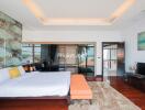 Modern bedroom with large bed, wall art, and sliding glass doors.