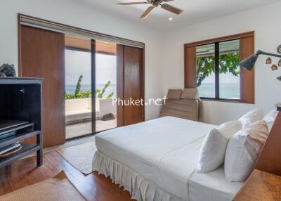 Cozy bedroom with ocean view