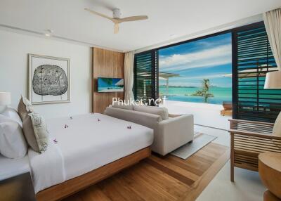 Modern bedroom with ocean view and balcony