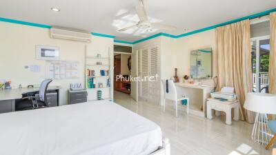 Bright and spacious bedroom with study area