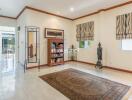 Spacious living room with natural light and decorative elements