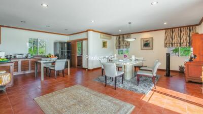 Spacious living and dining area with modern amenities and natural lighting