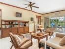 Spacious living room with large windows and garden view