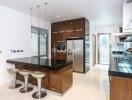 Modern kitchen with island and stainless steel appliances