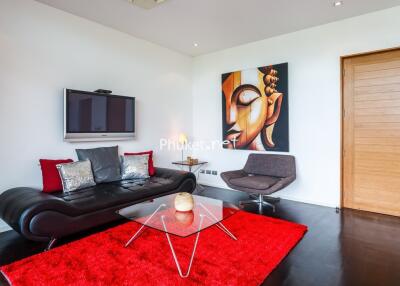 Modern living room with contemporary furniture and artwork