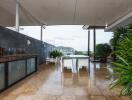 Spacious outdoor area with dining table and plants