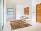 Entrance hallway with a brown rug