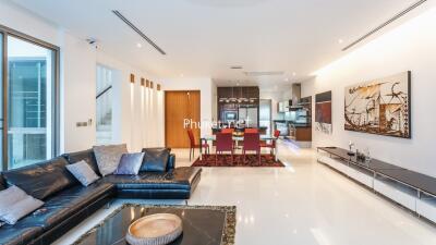 Spacious modern living room with kitchen and dining area