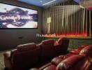 Home theater with red chairs and large screen displaying Game of Thrones