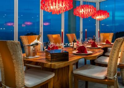Elegant dining room with a scenic view and stylish lighting