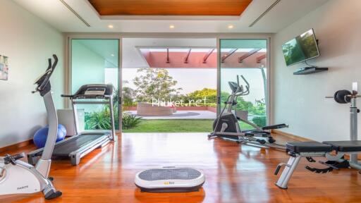 Home gym with exercise equipment and outdoor view