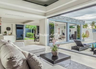 Modern living room with outdoor view and pool