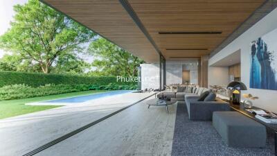 Modern living area with open view to a garden and swimming pool