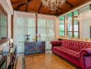 Elegant living room with chandelier and large sofa