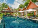 luxury outdoor pool area with traditional architecture