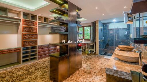 Modern bathroom with dual sinks and walk-in shower