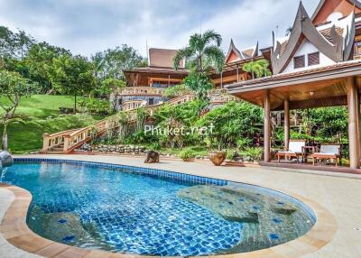 Luxury outdoor area with pool and landscaped garden