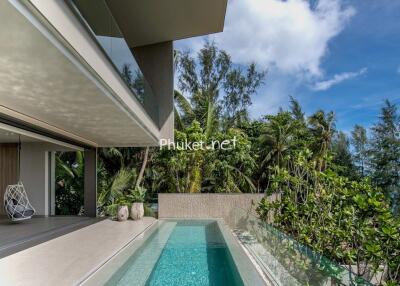 Modern luxury outdoor living area with pool and views