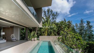 Modern luxury outdoor living area with pool and views