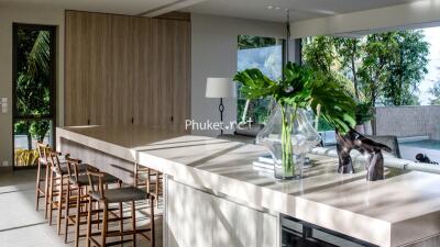 Modern kitchen with large island and stools