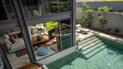 Spacious living area with pool view