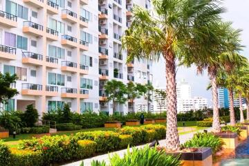 Modern apartment building with lush greenery