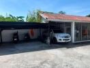 Spacious garage with shaded parking and a sheltered area