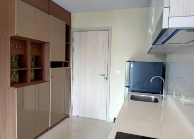 Modern kitchen with built-in cupboards and appliances