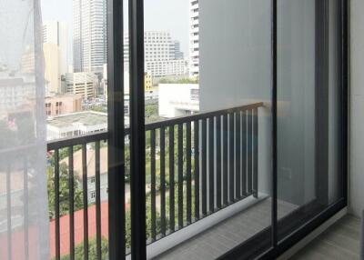 Modern balcony with city view and double sliding glass door