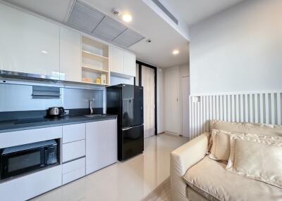 modern kitchen with living area