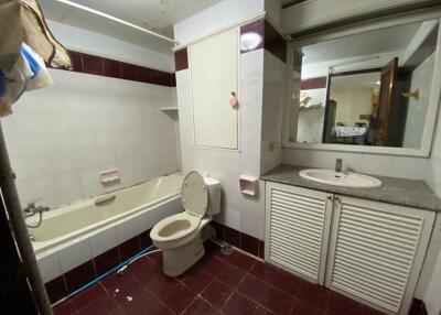 Bathroom with bathtub, toilet, and vanity sink