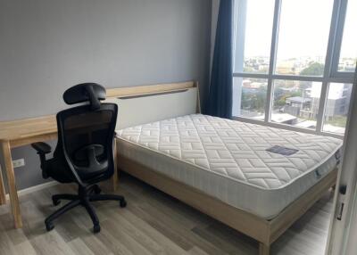 Modern bedroom with desk and chair