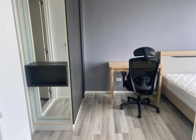 Modern bedroom with desk and chair