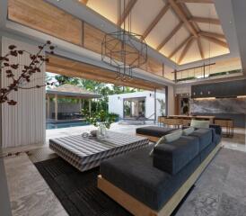 Modern living room with high ceiling and open concept design