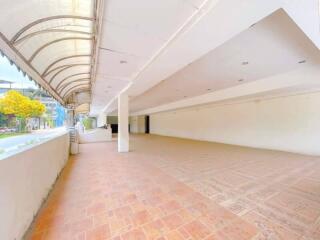 Covered outdoor area with tiled flooring