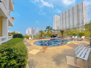 Swimming pool area with surrounding buildings