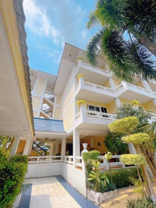 Exterior view of a multi-story building with balconies