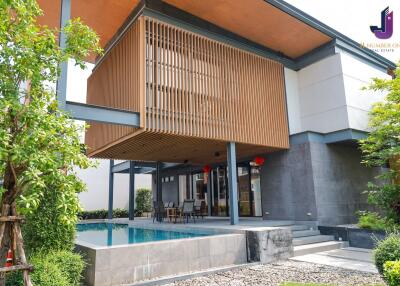 Modern two-story house with an outdoor pool