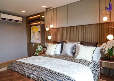 Modern bedroom with double bed and stylish decor