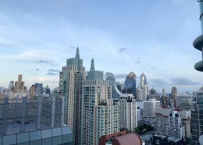 Aerial view of city skyline with modern high-rise buildings