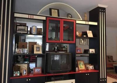 Living room with entertainment center and various decorations