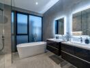 Modern bathroom with bathtub and double sink vanity