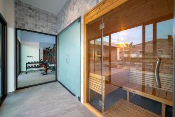 Sauna and gym area with modern equipment