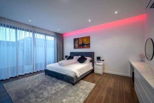 Modern bedroom with decorative lighting