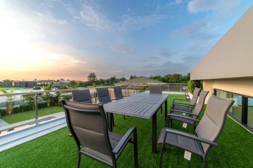 Rooftop terrace with outdoor dining furniture