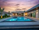 Modern backyard with a pool at sunset