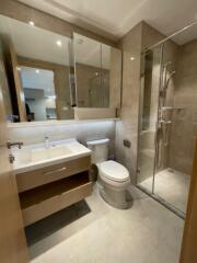 Modern bathroom with glass shower and vanity