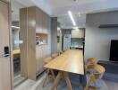 Modern dining area with wooden table and chairs