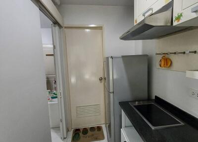 Modern kitchen area with appliances